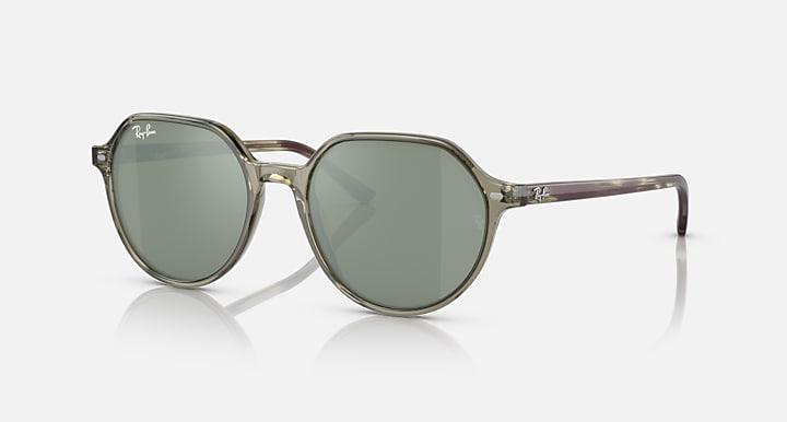 Ray-Ban Thalia sunglasses with round green lenses and olive translucent frame, straight arms