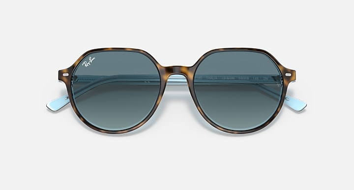 Ray-Ban Thalia sunglasses with tortoiseshell frame and teal tinted lenses