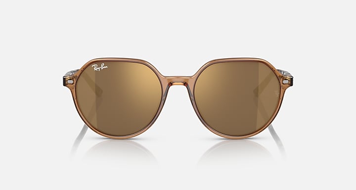 Ray-Ban Thalia RB2195 round sunglasses with brown-tinted lenses, thin gold-tone frame