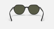 Round black sunglasses with dark green lenses and angled, sculpted temples.