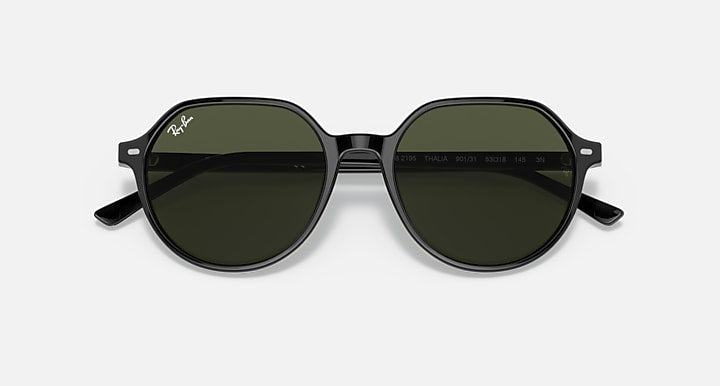 Round black sunglasses with dark green lenses and Ray-Ban logo on temple.