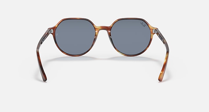 Ray-Ban Thalia RB2195 sunglasses with blue-gray lenses and tortoise round frame