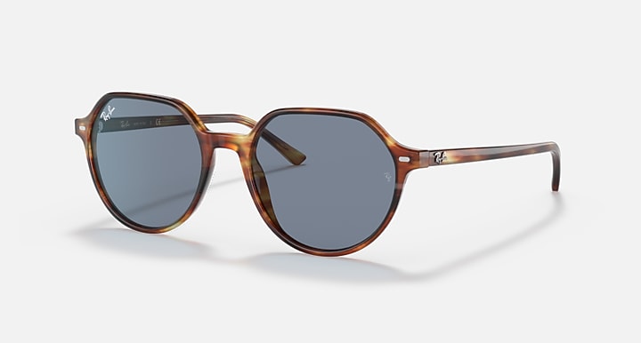 Ray-Ban Thalia RB2195 sunglasses with blue-gray lenses and brown round frames