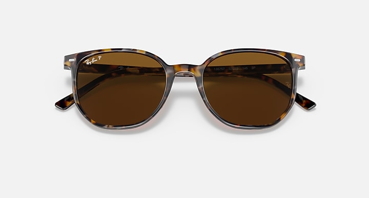 Tortoise sunglasses with dark brown-tinted lenses and visible temple tips.