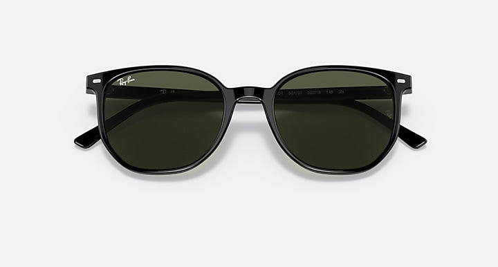 Sunglasses with black frame and dark green lenses, classic cat-eye silhouette.