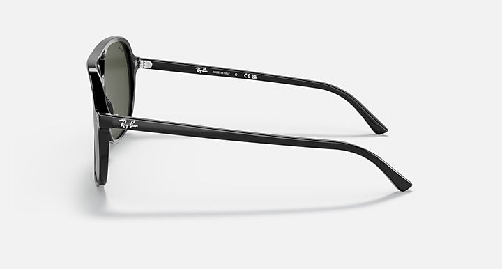 Ray-Ban Bill sunglasses side profile with black frame and dark green lens.