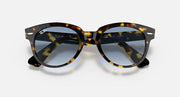 Ray-Ban Orion sunglasses, yellow havana frame with blue-tinted gradient lenses