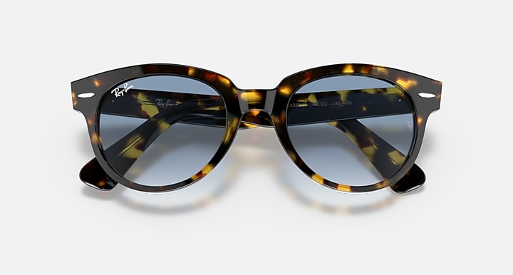 Ray-Ban Orion sunglasses, yellow havana frame with blue-tinted gradient lenses