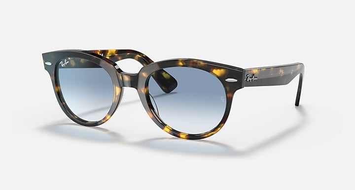 Ray-Ban Orion sunglasses, yellow havana frame, clear blue gradient lenses