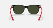 Black cat-eye sunglasses with dark green lenses and red temple arms