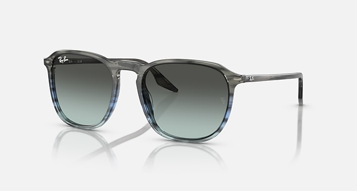 Ray-Ban RB2203 sunglasses with dark green lenses, black frame, angled side view