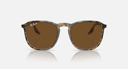 Havana-style round sunglasses with brown tinted lenses and tortoise frame