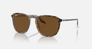 Havana-style square sunglasses with brown tinted lenses and clear bridge