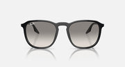 Black Ray-Ban sunglasses with gray lenses and center bridge detail