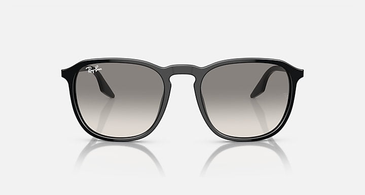 Black round sunglasses with dark gray tinted lenses