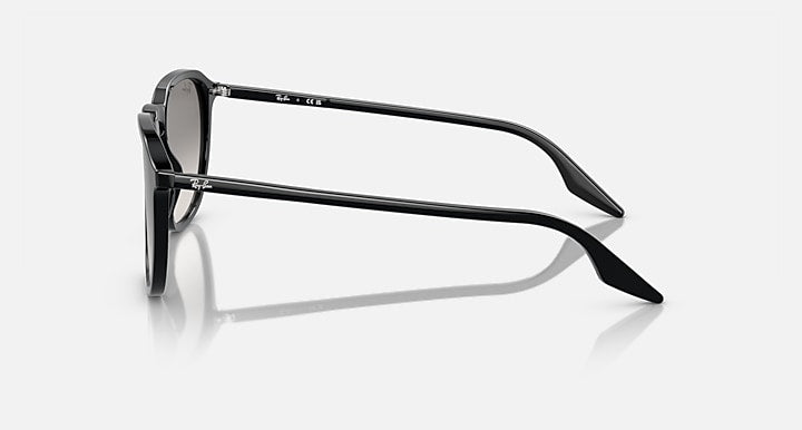 Black-accent rectangular sunglasses, side profile with dark lenses