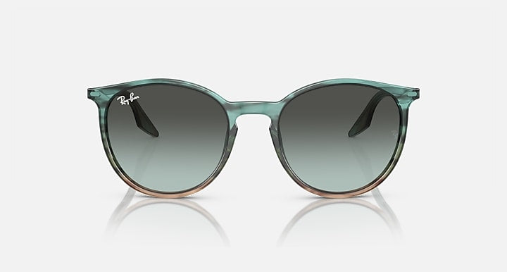 Ray-Ban green sunglasses with round dark lenses and transparent frame, front view.