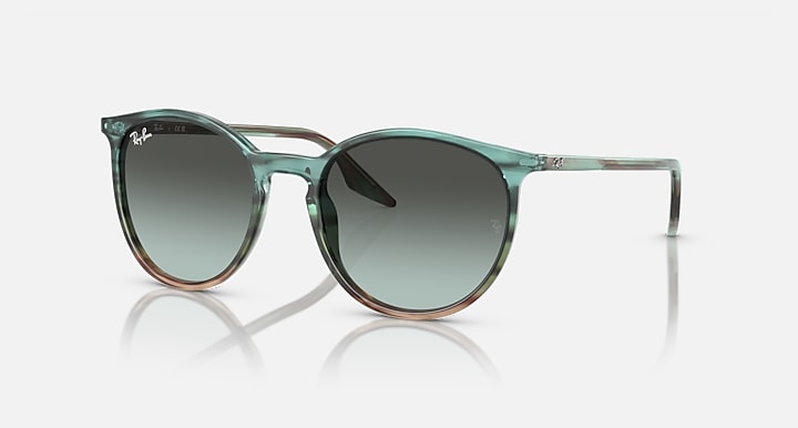 Ray-Ban green sunglasses with round dark lenses and clear metal arms, side profile.