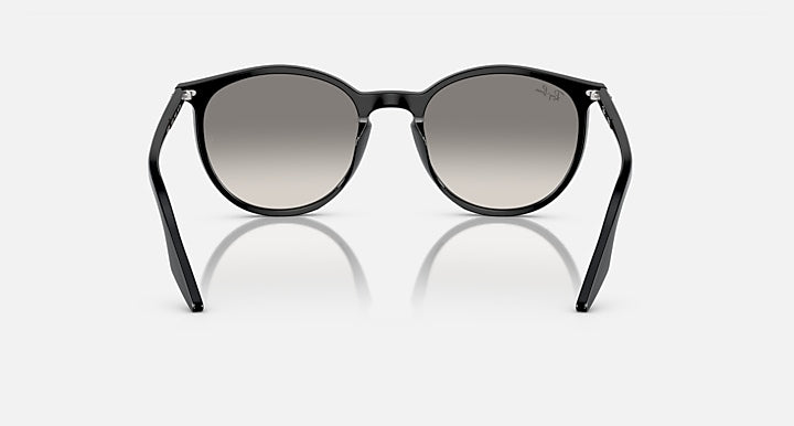 Black round sunglasses front with dark lenses and curved metal arms