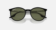 Ray-Ban round sunglasses with dark green lenses and black frame, mirrored look