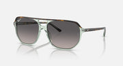 Ray-Ban Bill One sunglasses, translucent green frame with dark lenses.