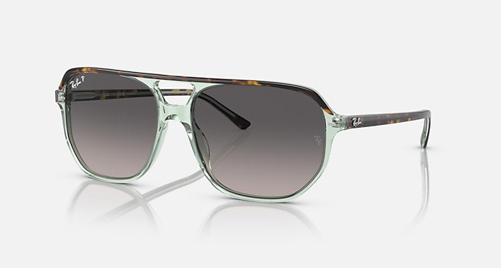 Ray-Ban Bill One sunglasses, translucent green frame with dark lenses.