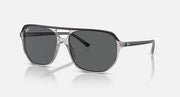 Ray-Ban Bill One RB2205 sunglasses, transparent frame with dark gray lenses and side logo.
