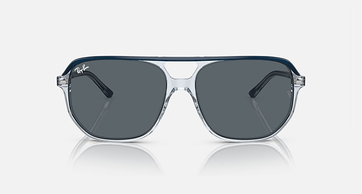 Ray-Ban Bill One RB2205 sunglasses, front view with transparent frame, blue accents, dark gray lenses.