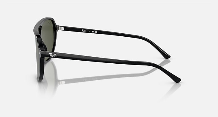 Ray-Ban Bill One sunglasses, side profile with black frame and dark green lens