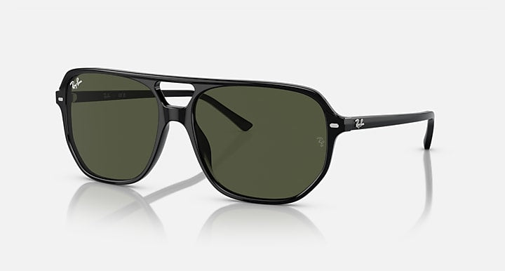 Ray-Ban Bill One sunglasses with dark green lenses and black frames, side arms visible