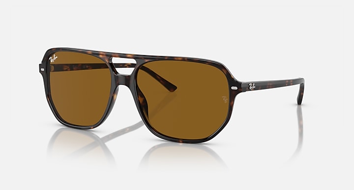 Ray-Ban Bill One sunglasses with tortoiseshell frame and amber-brown lenses, side view
