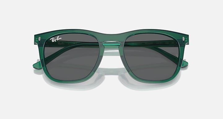Green Ray-Ban wayfarer-style sunglasses with dark gray lenses and clear temple tips