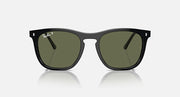 Black sunglasses with dark green lenses and distinctive angular frame silhouette
