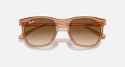 Ray-Ban RB2210 sunglasses with translucent brown frame and brown tinted lenses, top view