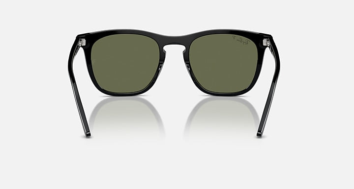Black sunglasses with dark green lenses, front view with silver bridge and straight temples