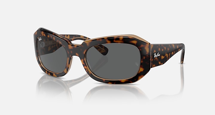 Tortoise brown striped sunglasses with dark gray lenses and slim rectangular frames