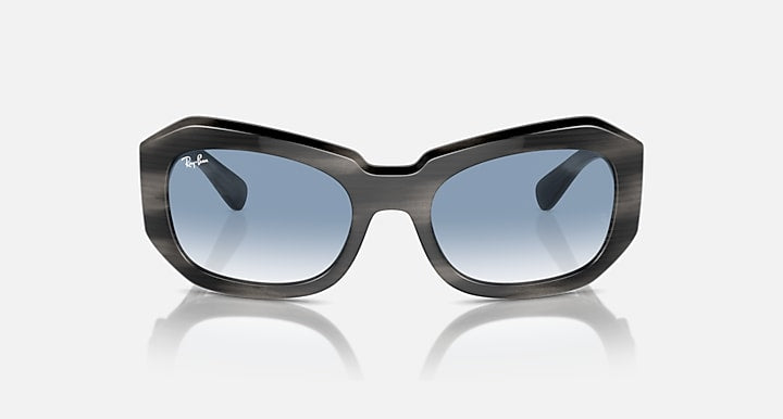 Ray-Ban Beate sunglasses, dark smoke oversized cat-eye shape with blue lenses