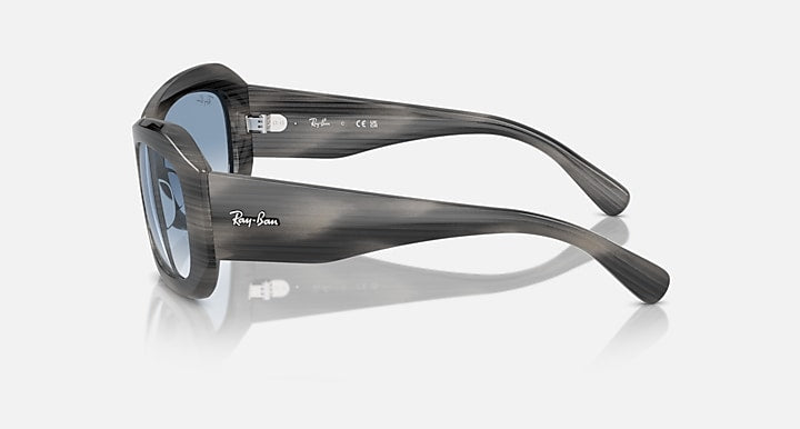 Ray-Ban Beate sunglasses, side view with dark smoke arms and blue lenses