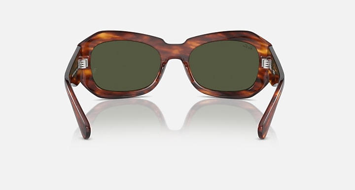 Sunglasses with tortoiseshell brown frame, dark green lenses, straight front