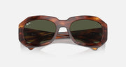 Sunglasses with tortoiseshell brown frame and dark green lenses, angled view