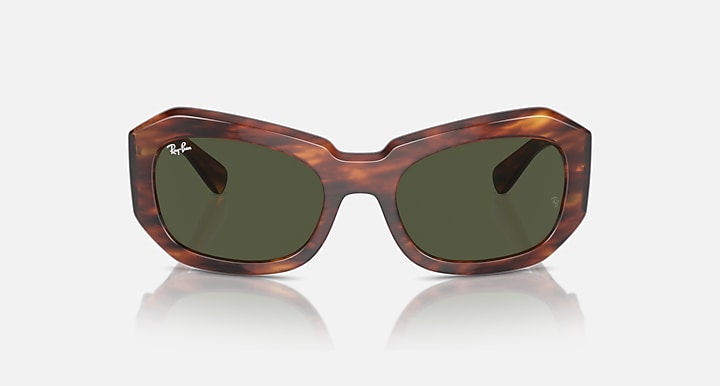 Sunglasses with tortoiseshell brown frame and dark green lenses, front view