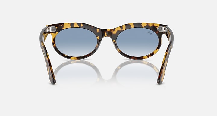 Ray-Ban Wayfarer oval sunglasses, tortoise-pattern frame and blue-tinted lenses straight on