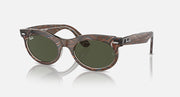 Oval sunglasses with tortoise-pattern frame and dark green lenses