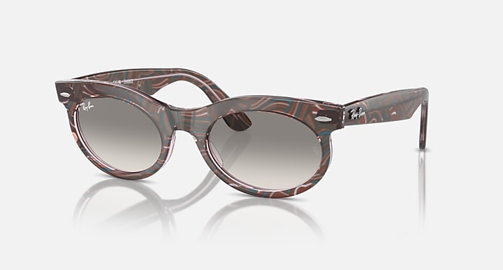 Wayfarer oval sunglasses with dark tortoise frame and gray round lenses