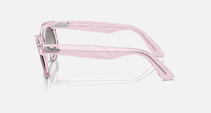 Wayfarer oval sunglasses with pink frame, side view, round lenses