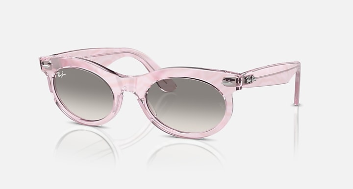 Wayfarer oval sunglasses with pink frame and light gray round lenses