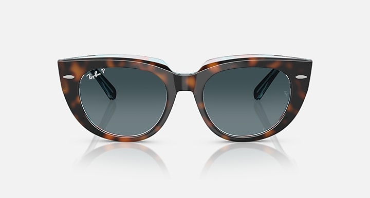 Cat-eye sunglasses with dark tortoiseshell frames and tinted gray lenses, front view