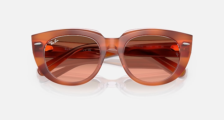 Ray-Ban Doreen RB2286 sunglasses with transparent orange frame and dark brown tinted lenses