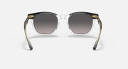 Ray-Ban sunglasses with clear/transparent frame, dark lenses and gold-tone accents