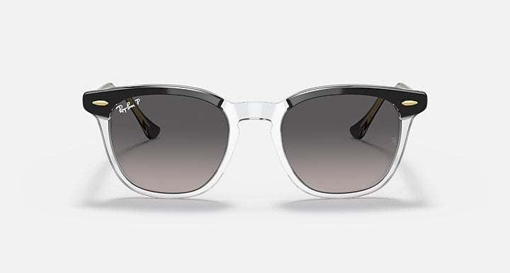 Ray-Ban sunglasses with clear/transparent frame and dark gray lenses, front view
